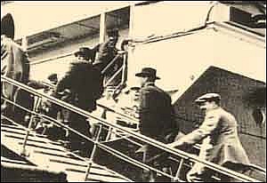 Photo:  Passengers boarding the Titanic